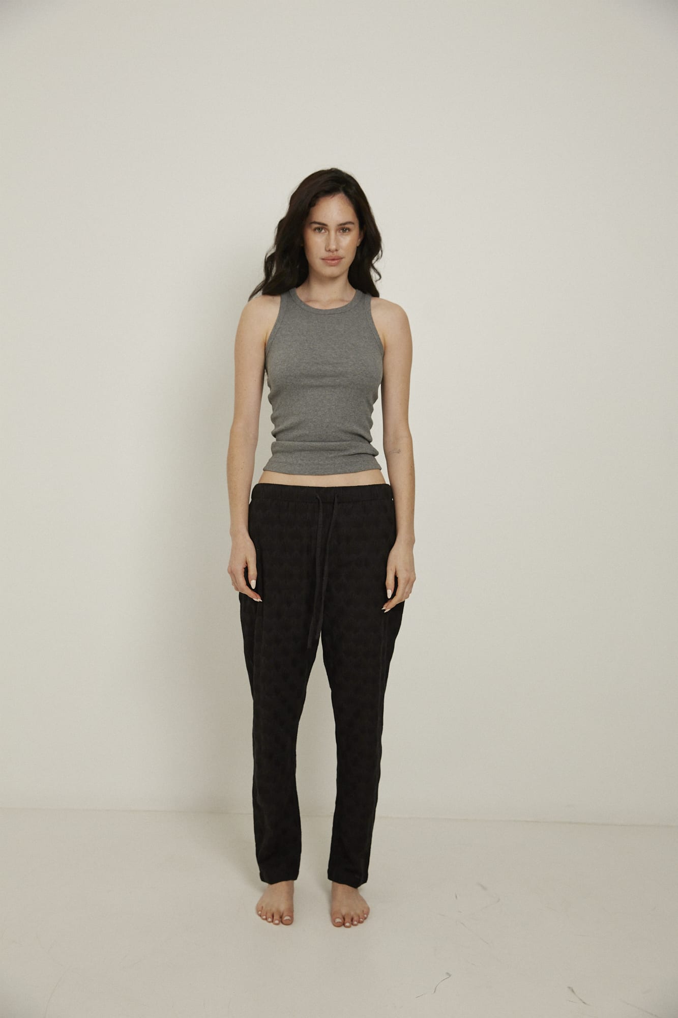 Women’s pyjama pant.  Made from 100% organic cotton, in black colour featuring delicate all over embroidery. These pants feature an elasticated waistband with a drawstring for comfort.