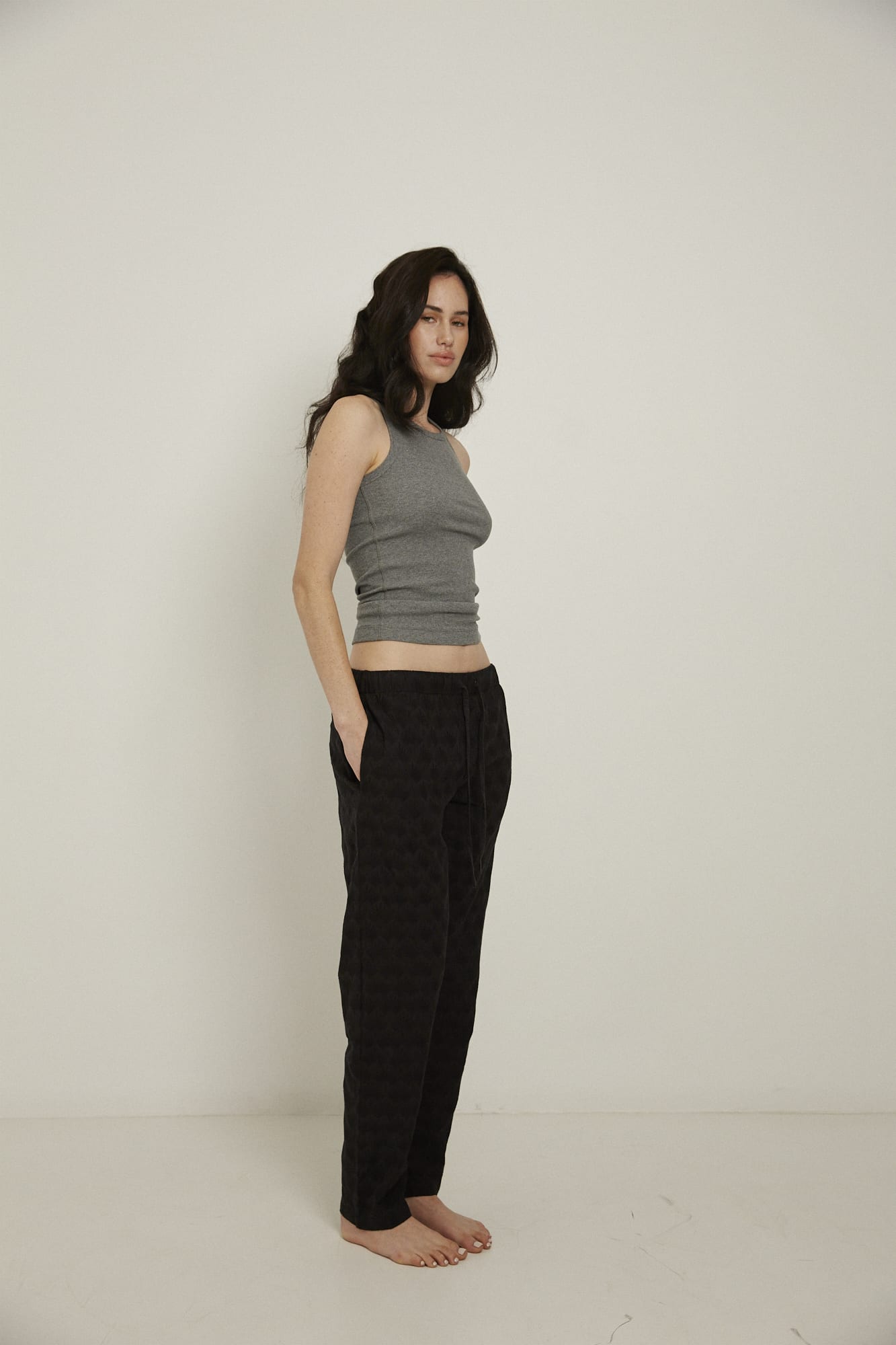 Women’s pyjama pant.  Made from 100% organic cotton, in black colour featuring delicate all over embroidery. These pants feature an elasticated waistband with a drawstring for comfort.