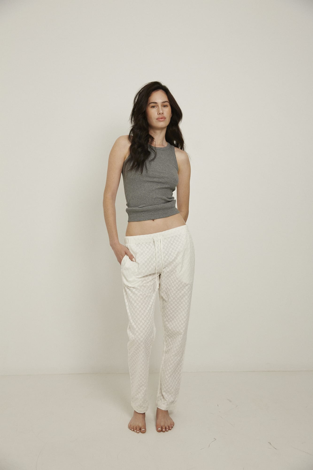 Women’s pyjama pant.  Made from 100% organic cotton, in white colour featuring delicate all over embroidery. These pants feature an elasticated waistband with a drawstring for comfort.
